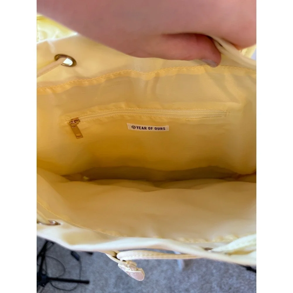 Year of Ours Nylon Backpack Pale Yellow Drawstring Buckle Flap OS NWT
